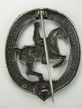 Знак наездника в серебре.