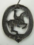 Знак наездника в серебре.
